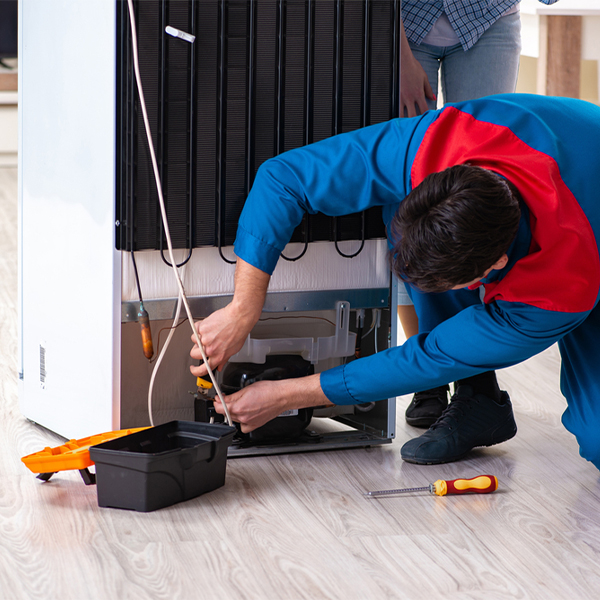 how much do you charge for refrigerator repair services in Raymond